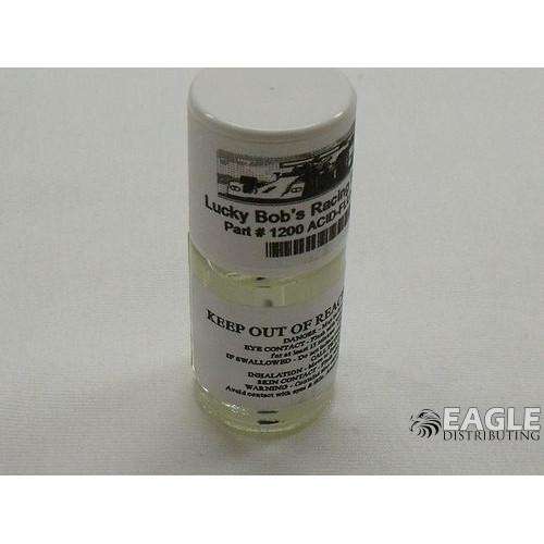 Lucky Bob's acid flux w/ applicator brush in a glass bottle.